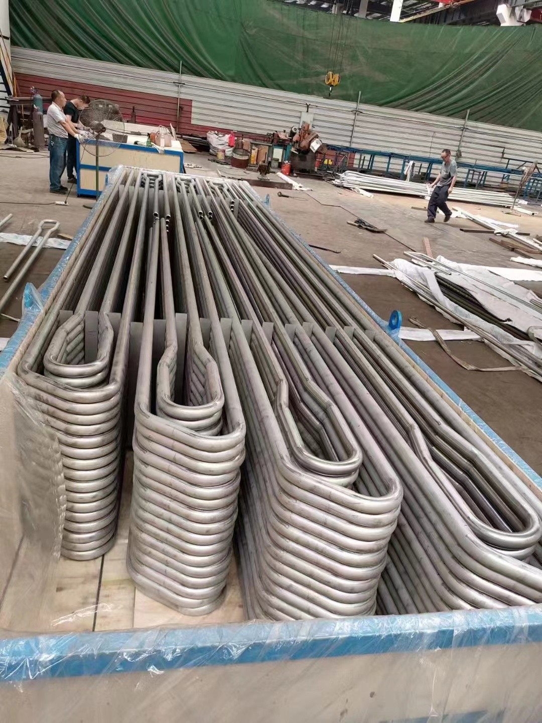 Φ38.1×7.5 SA-213T2 每件9根水冷壁管一排，长12米，管节距50.8mm,鳍片连接，鳍片为膜式扁钢厚δ6.4㎜，材料为15CrMo，采用双面坡口焊接型式